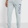 Šedé pánské tepláky s logem Ralph Lauren Šedé pánské tepláky s logem Ralph Lauren