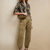 Černé dámské košile Ralph Lauren Keara s volánkovým trimem a kovovým lemem Černé dámské košile Ralph Lauren Keara s volánkovým trimem a kovovým lemem